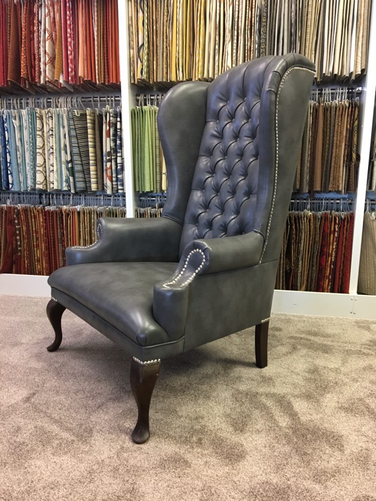 Grey chair Detailed upholstery.